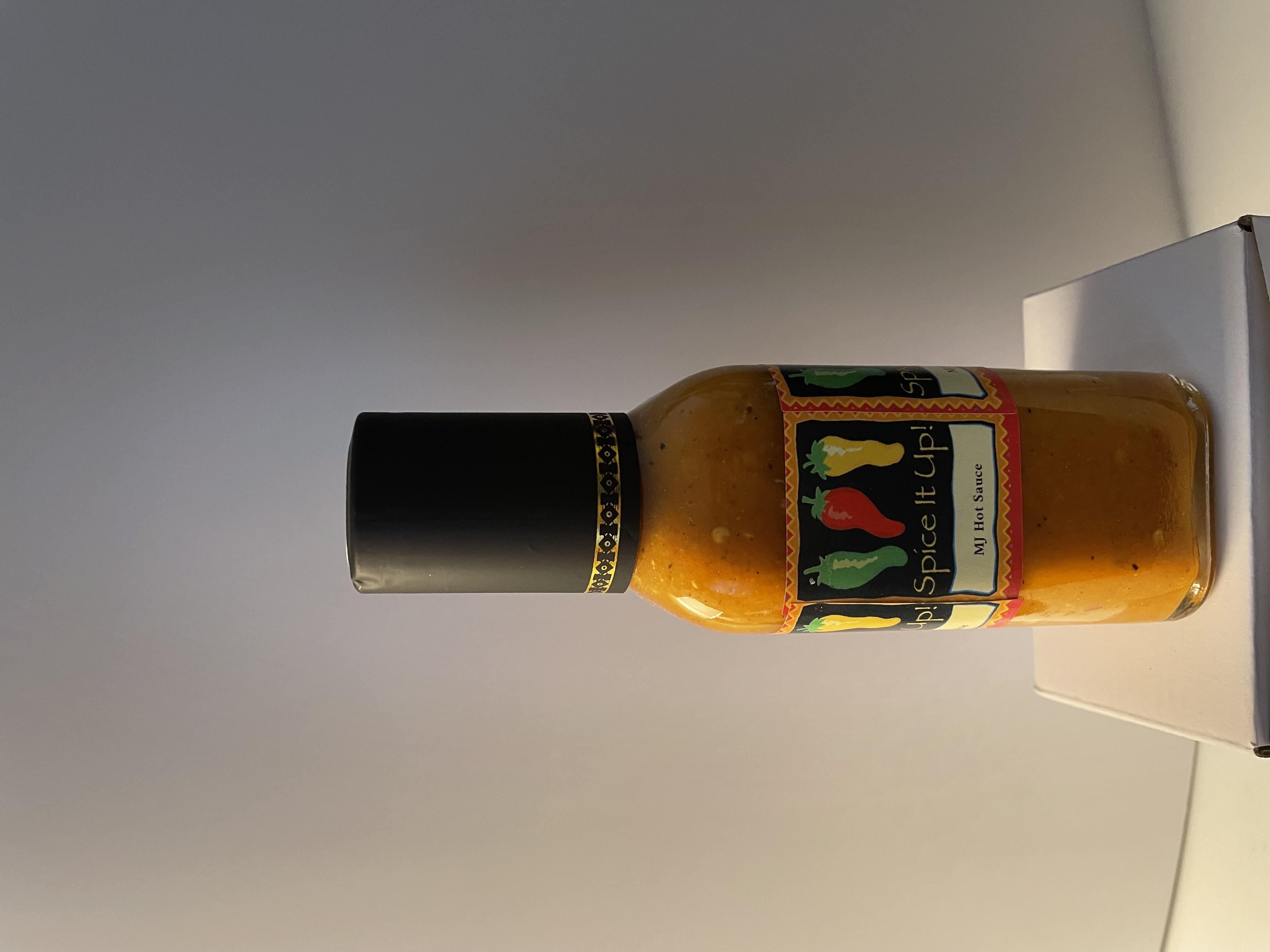 MJ's Hot Sauce bottle in natural lighting